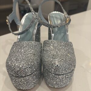 Chara Ferragni Silver Sparkle Platform Shoes
MJ wedge